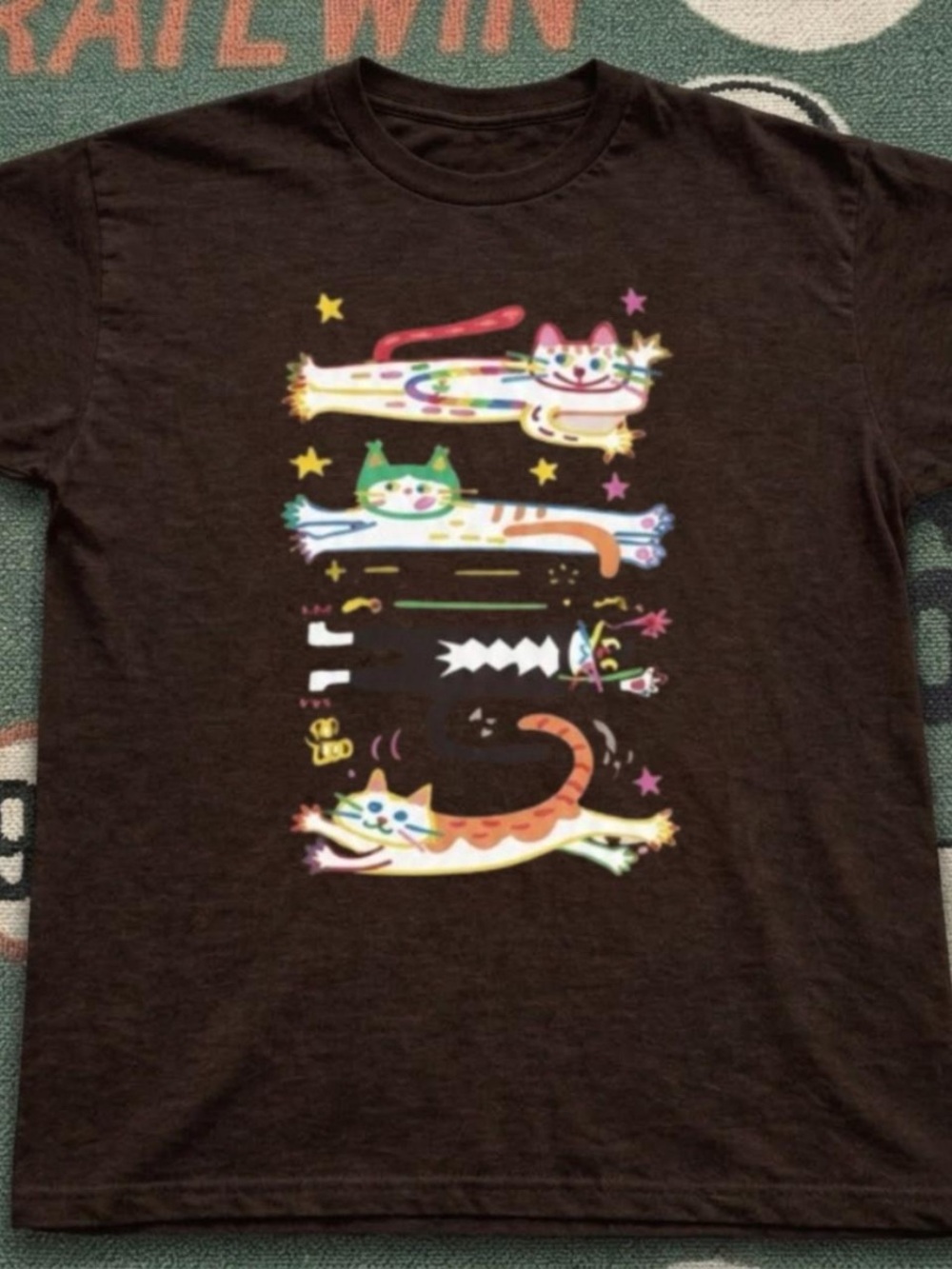 Black Tee with Colorful Running Cat Print